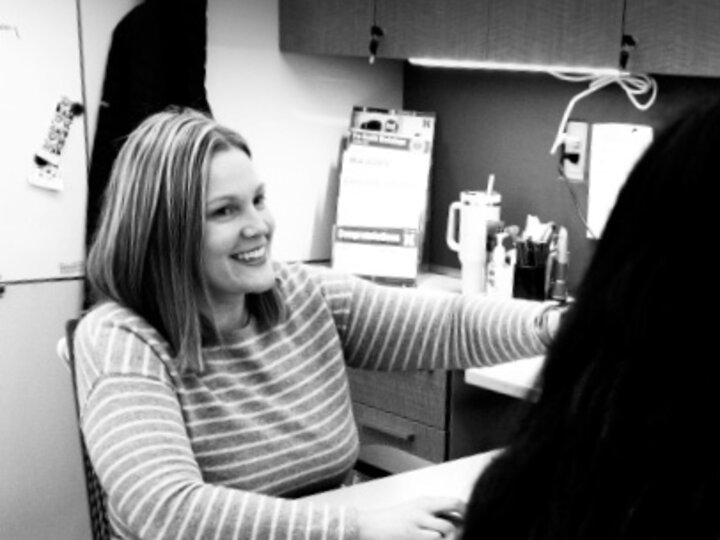 Academic Advisor Bethany Heaney works with a student at the Explore Center.